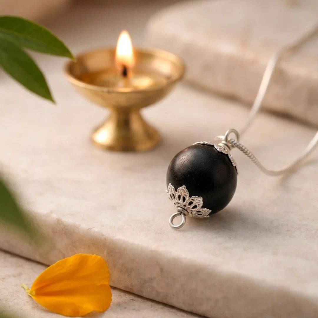 12mm Karungali Guru Bead with silver plated chain by Saadhak for grounding, protection, and everyday spiritual wear.