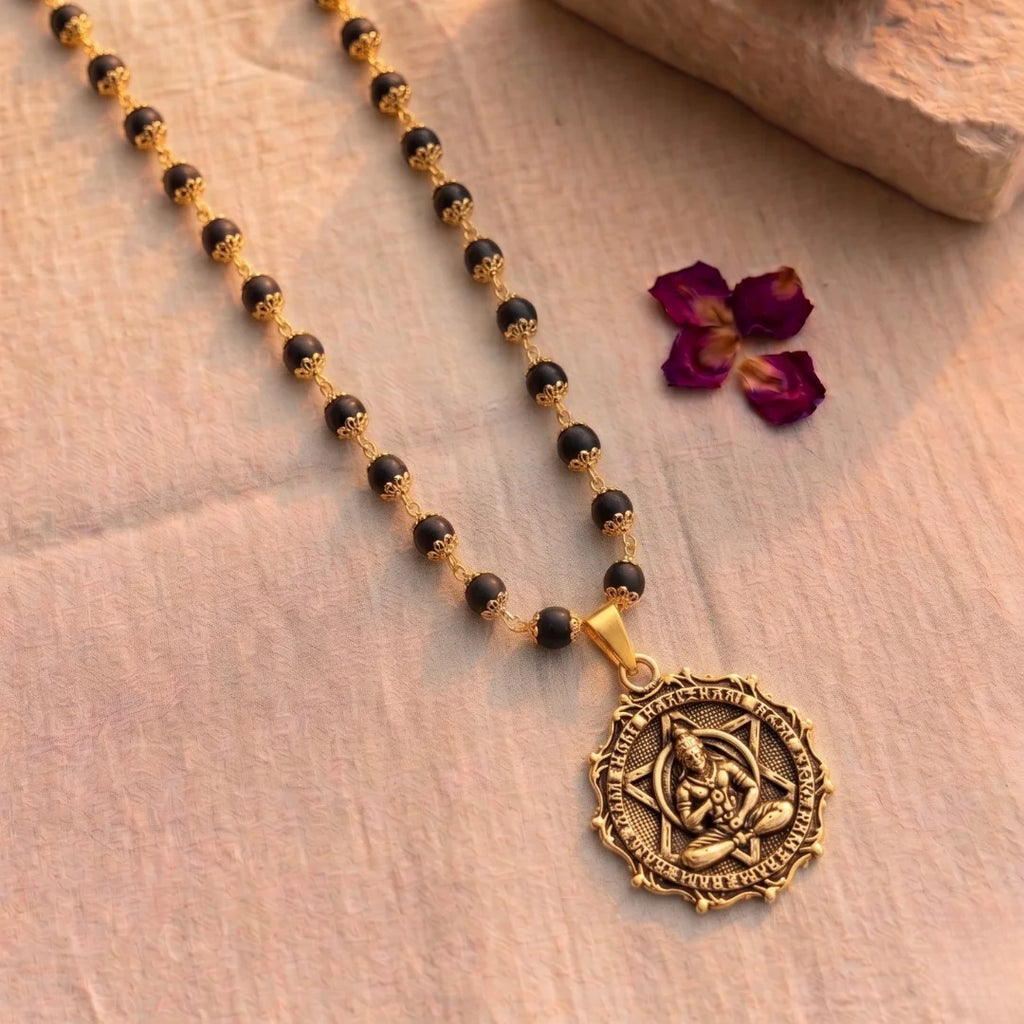 Gold plated Karungali necklace by Saadhak with Meditating Hanuman pendant for protection, devotion, strength, and daily wear.