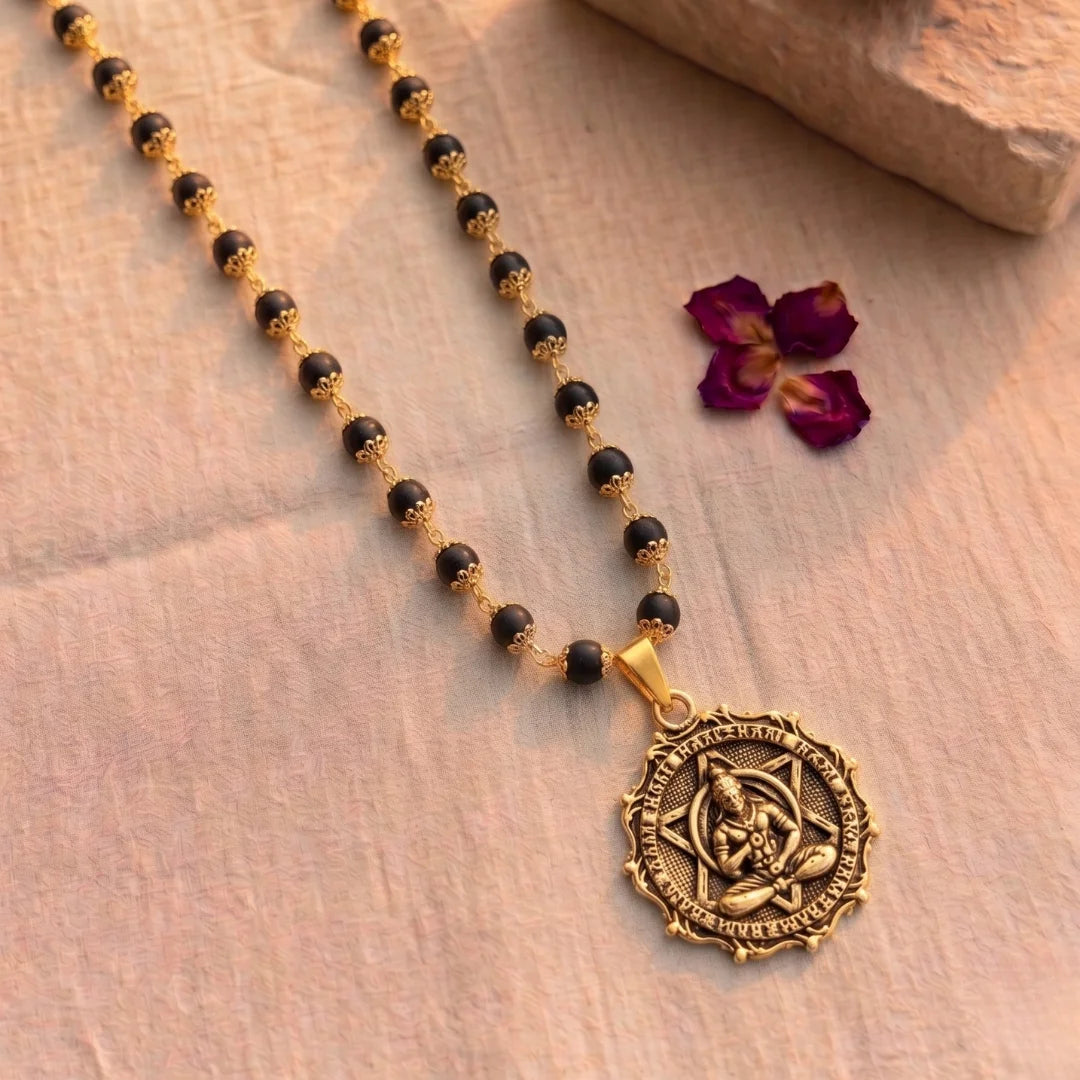 Gold plated Karungali necklace by Saadhak with Meditating Hanuman pendant for protection, devotion, strength, and daily wear.