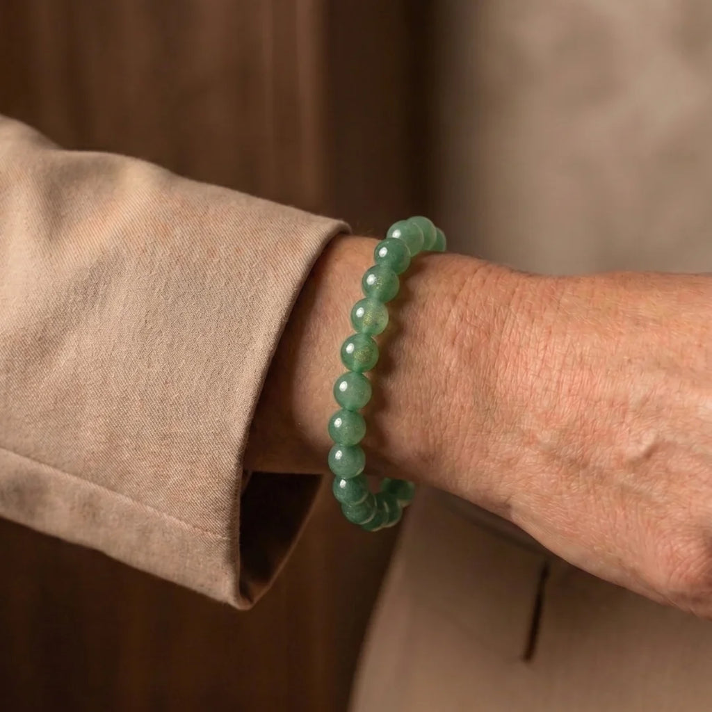 Natural Green Aventurine bracelet by Saadhak with polished gemstone beads for prosperity, balance, and everyday spiritual wear.