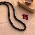 Karungali mala by Saadhak with durable elastic thread, handcrafted for grounding, protection, and everyday spiritual wear.