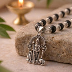 Karungali Murugan mala by Saadhak with sacred beads and Lord Murugan pendant for protection, strength, and spiritual wear.