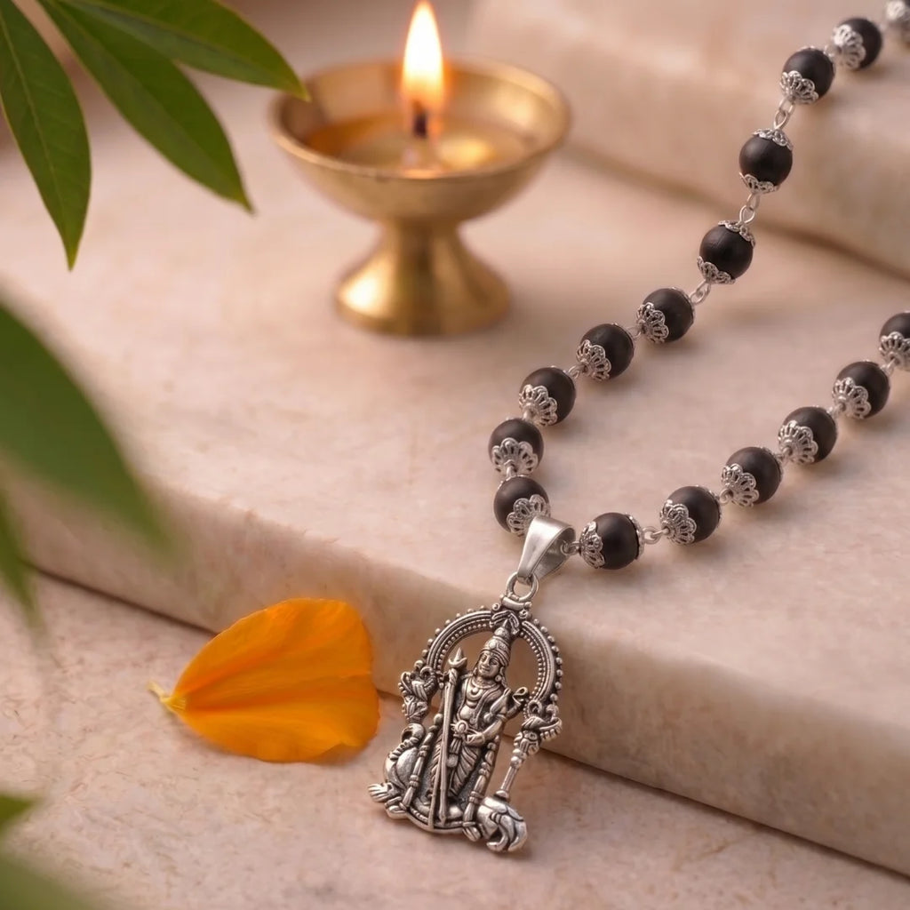 Karungali Murugan mala by Saadhak with sacred beads and Lord Murugan pendant for protection, strength, and spiritual wear.