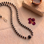 Karungali silver cap mala by Saadhak with 12mm Guru Bead for grounding, protection, spiritual balance, and daily wear.