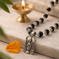 Karungali silver cap mala by Saadhak with Balaji pendant for protection, devotion, spiritual balance, and everyday wear.
