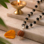 Karungali silver-capped mala by Saadhak with Rudraksha Guru Bead for protection, grounding, spiritual balance, and daily wear.