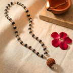 Karungali silver-capped mala by Saadhak with Rudraksha Guru Bead for protection, grounding, spiritual balance, and daily wear.