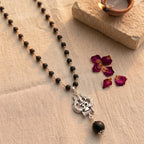 Karungali Trishul pendant mala by Saadhak for protection, grounding, spiritual strength, and everyday devotional wear.
