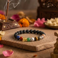 Handcrafted 9 Chakra Lava bracelet by Saadhak featuring natural lava stone and nine chakra gemstone beads.