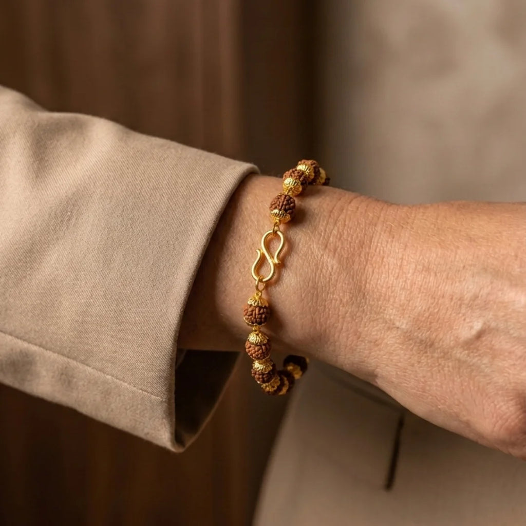 Handcrafted Golden Cap Rudraksha bracelet by Saadhak featuring authentic Rudraksha beads with gold-capped accents