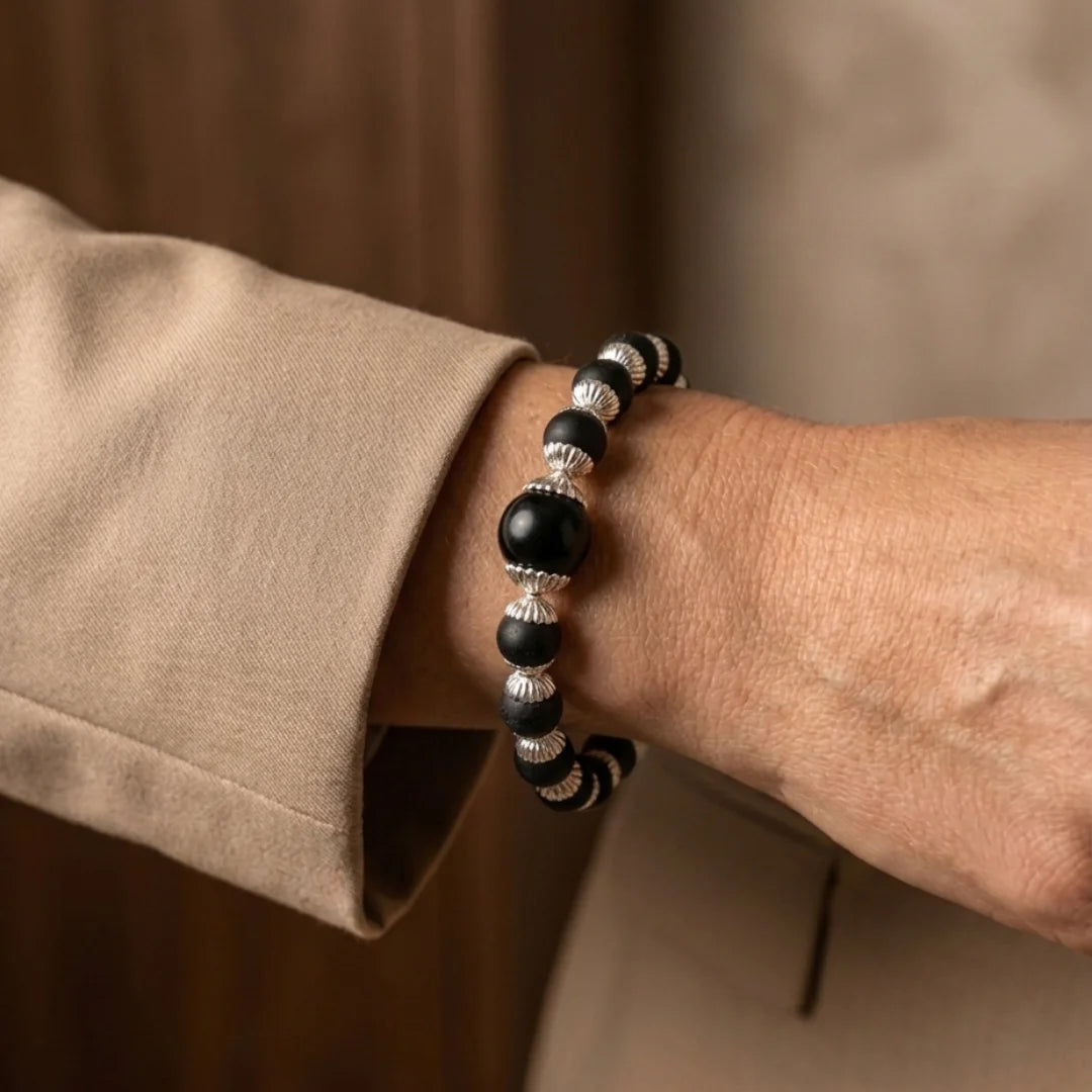 Handcrafted Karungali Mini Silver Cap bracelet by Saadhak featuring authentic ebony wood beads with silver-capped accents.