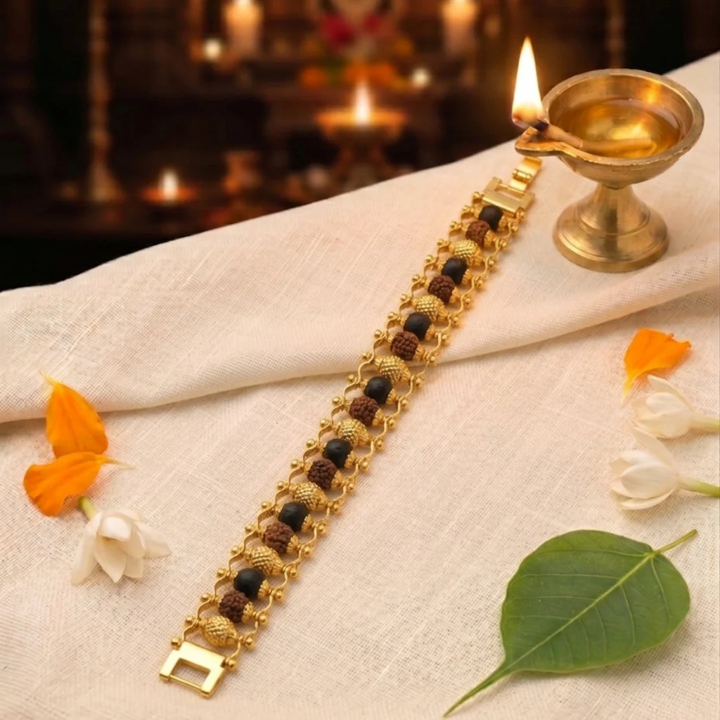 Handcrafted Karungali and Rudraksha Gold Plated bracelet by Saadhak featuring authentic ebony wood and Rudraksha beads.