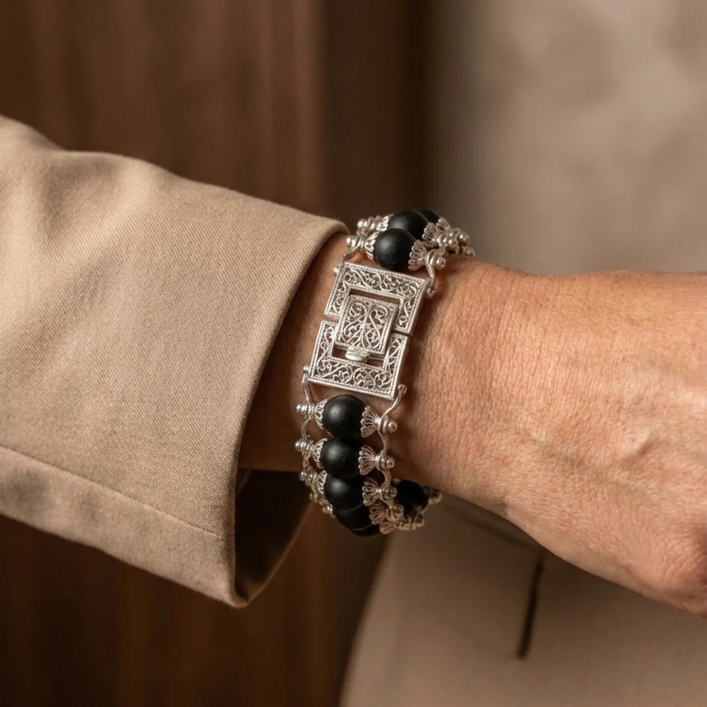 Handcrafted Karungali Silver Double Capped bracelet by Saadhak featuring authentic ebony wood beads with silver-capped accents.