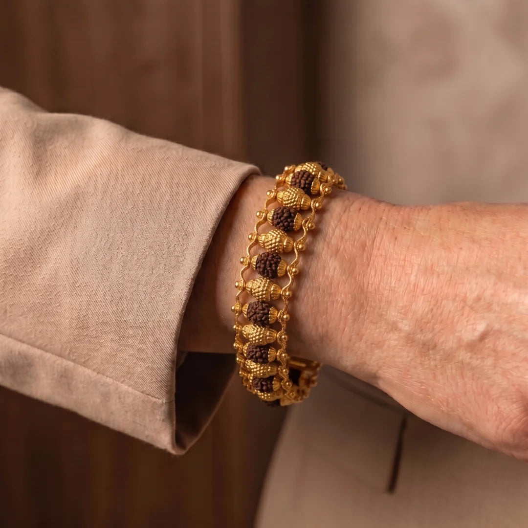 Handcrafted Rudraksha Gold Plated bracelet by Saadhak featuring authentic Rudraksha beads with gold-plated accents.