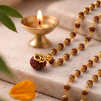 Shri Om 7 Mukhi Rudraksha mala by Saadhak for spiritual growth, protection, inner peace, and everyday devotional wear.